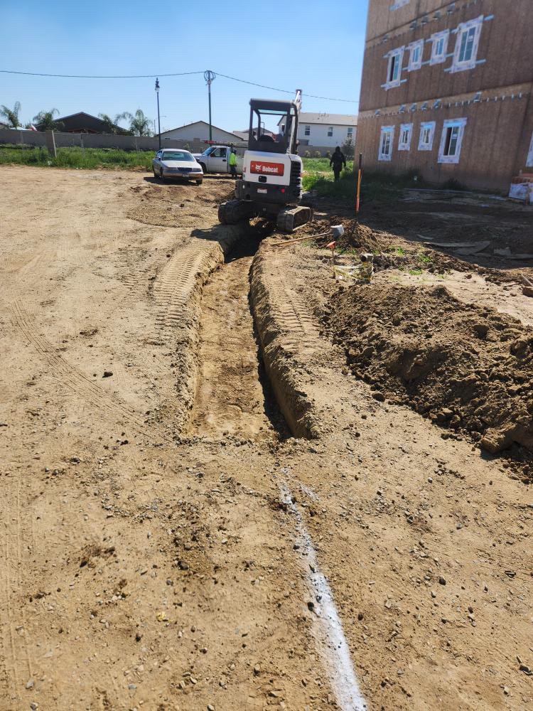 Utility trench cut and tracked access